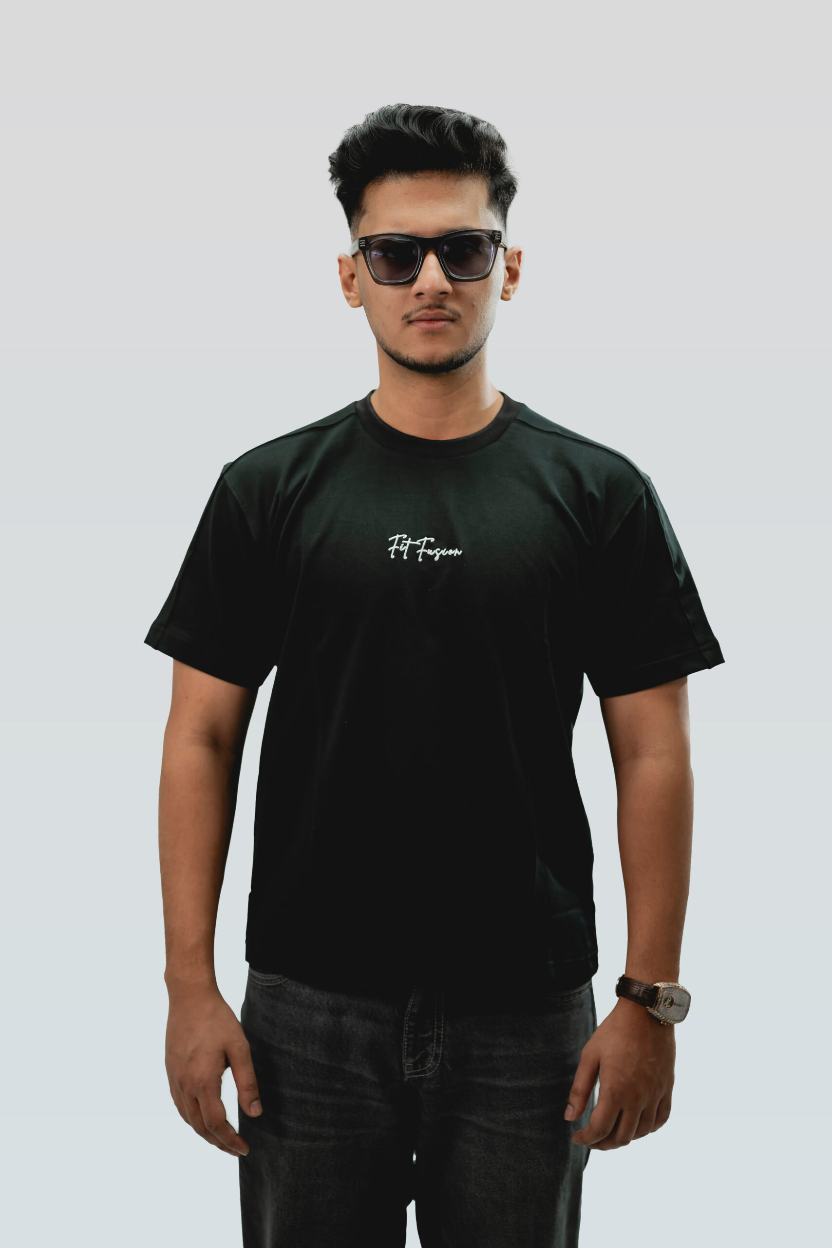 Man wearing black terry fabric drop shoulder t-Shirt with round neck