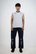 Man wearing sleeveless t shirt for gym styled with joggers